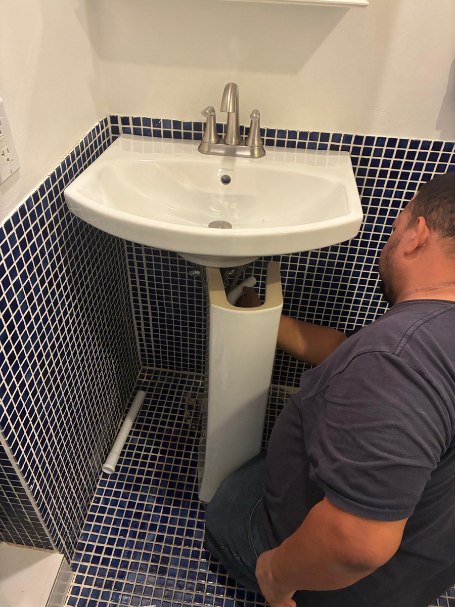 Pedestal sink installation