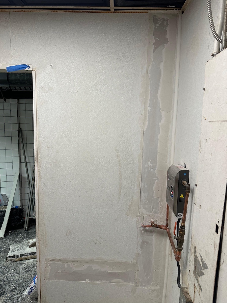 Drywall repair + plumbing work